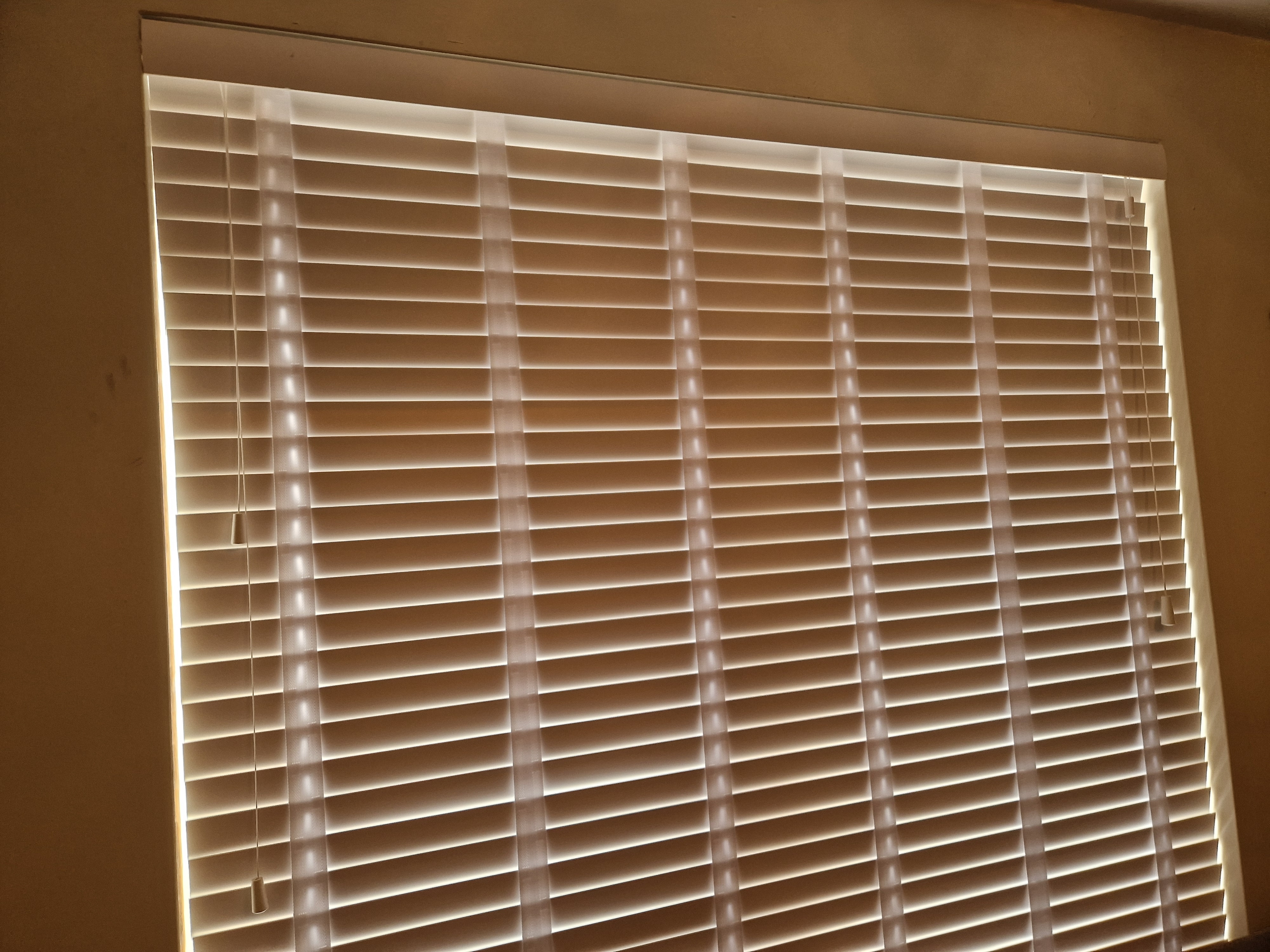 Wooden Blinds closed on a window from the inside